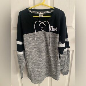 Size extra small, black, grey, and white long sleeve from pink.